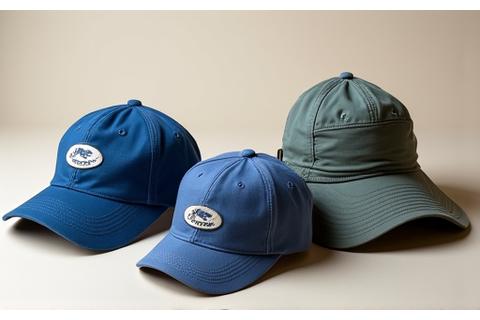 Collection of fishing hats, neck gaiters, and buffs in various outdoor patterns, suggesting sun and wind protection